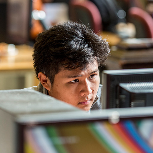 Student working on class regsitration on their computer