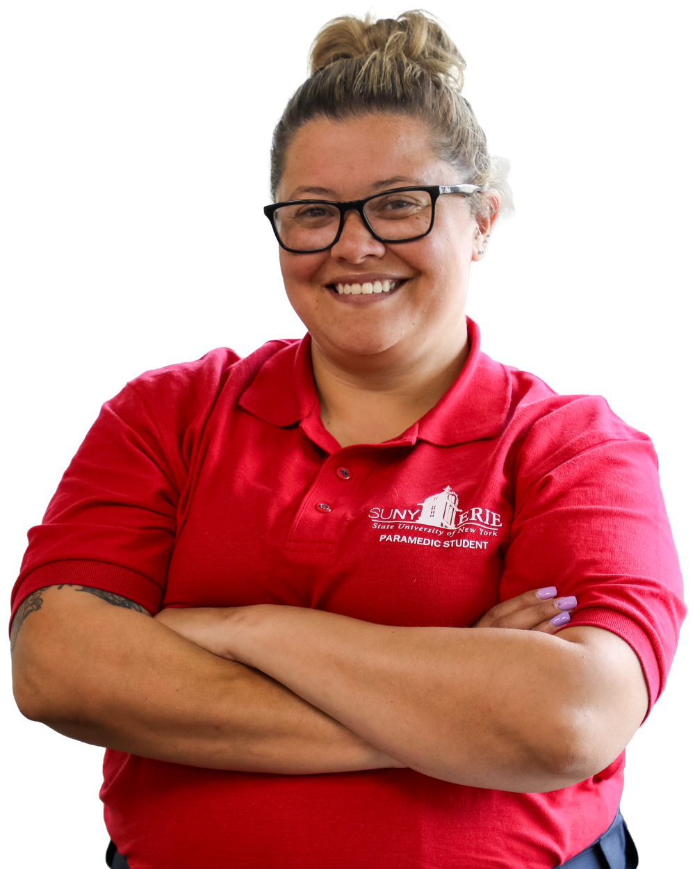 EMT Paramedic Student with her hair up in a bun in a red SUNY Erie Paramedic Student Polo
